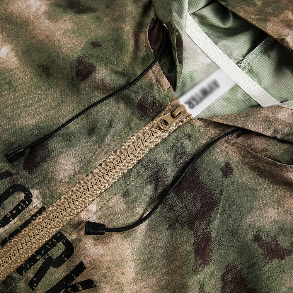 Hooded camouflage sun protection jacket for men, loose fit polyester fibre, shown in camouflage colour.