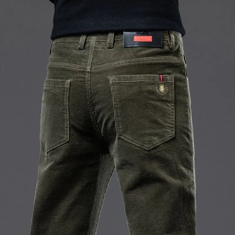 Men's thick corduroy straight trousers with belt in dark grey, shown folded on a neutral background.