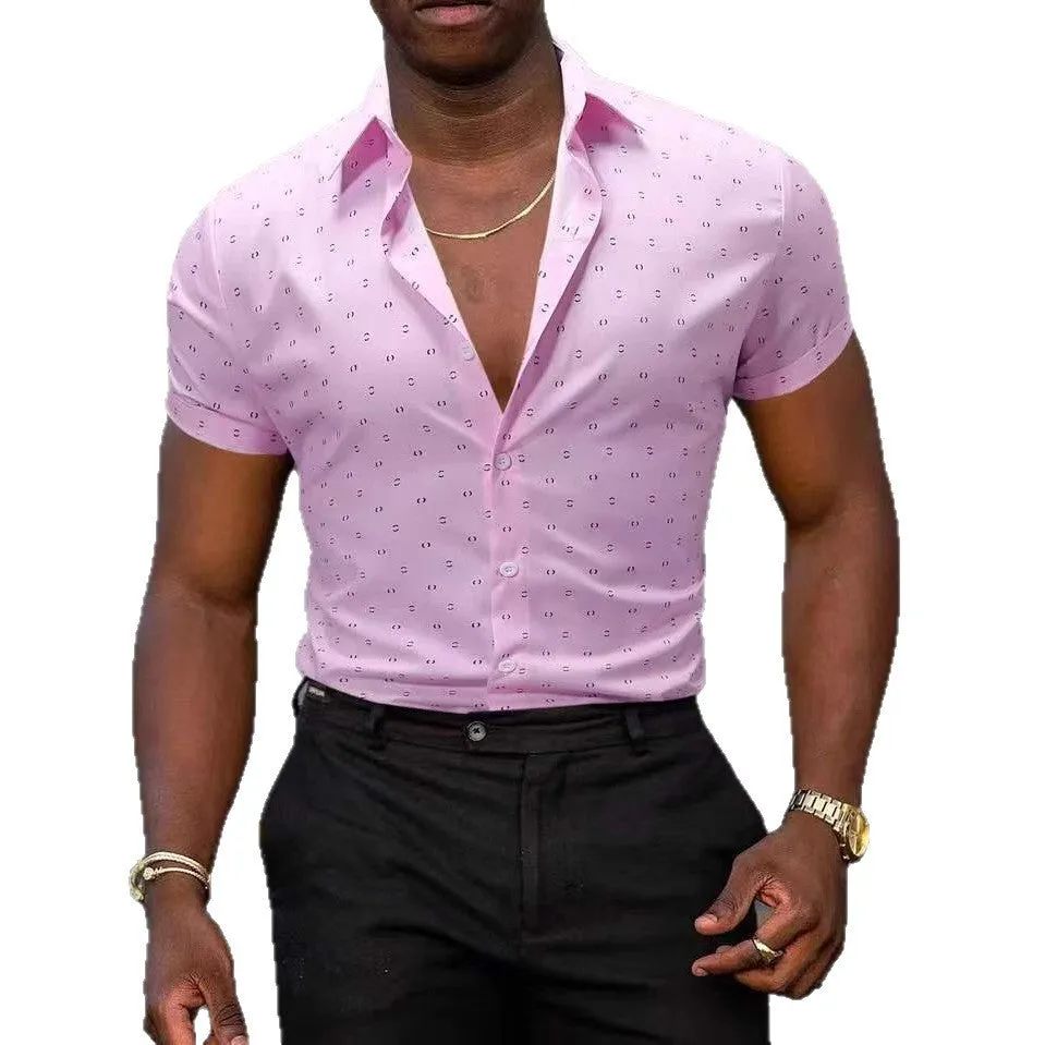 Man wearing a light blue short-sleeved casual shirt with a floral print pattern.