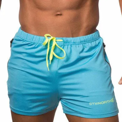 Mens quick-drying polyester blend swimming trunks in blue, with straight-leg design and nylon lining