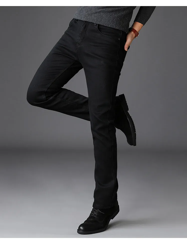 Men's slim straight black jeans made of cotton denim, flat lay