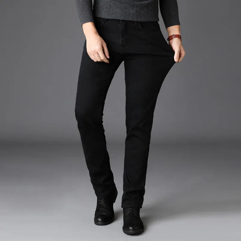 Men's slim straight black jeans made of cotton denim, flat lay