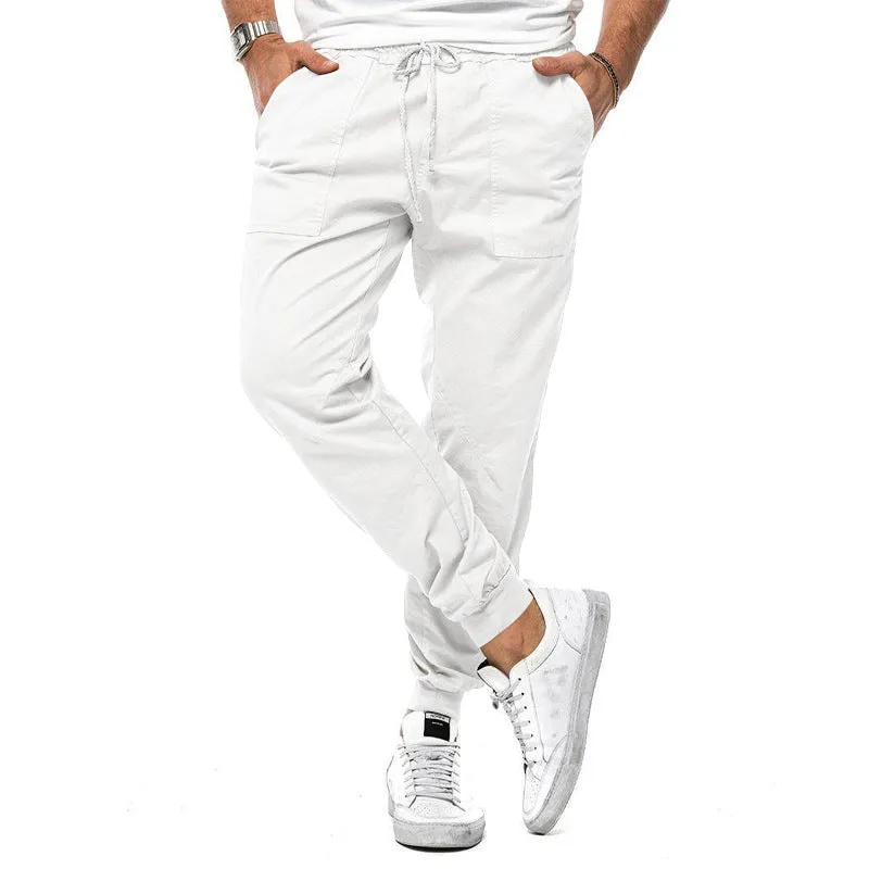 Men's loose tapered casual trousers with drawstring waist and ankle bands in solid colour