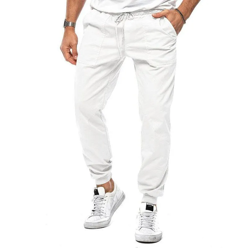 Men's loose tapered casual trousers with drawstring waist and ankle bands in solid colour