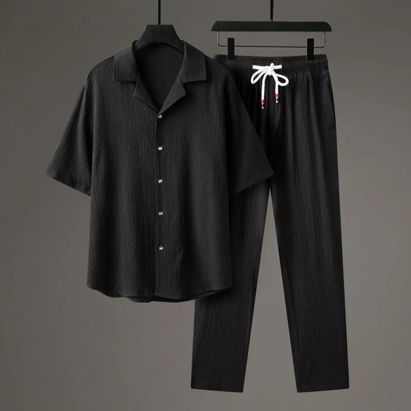 Men's grey Chinese-style casual two-piece sportswear set with short sleeve top and trousers on a hanger.