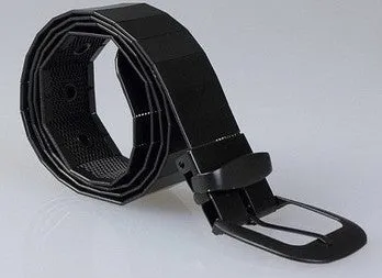 Three shiny belts in gold, silver, and black metallic finish arranged together