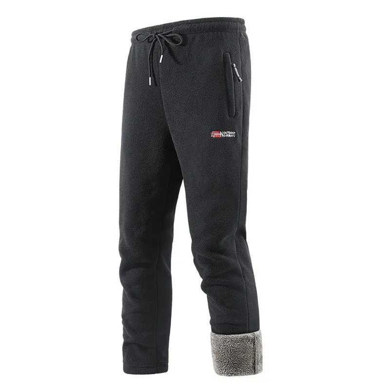 Women's flared patchwork trousers in black synthetic blend with low waist and asymmetrical design