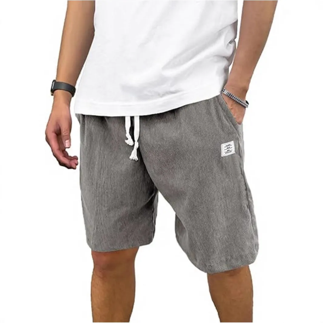 Men's straight-leg corduroy sports shorts in army green colour, showing texture and fit.