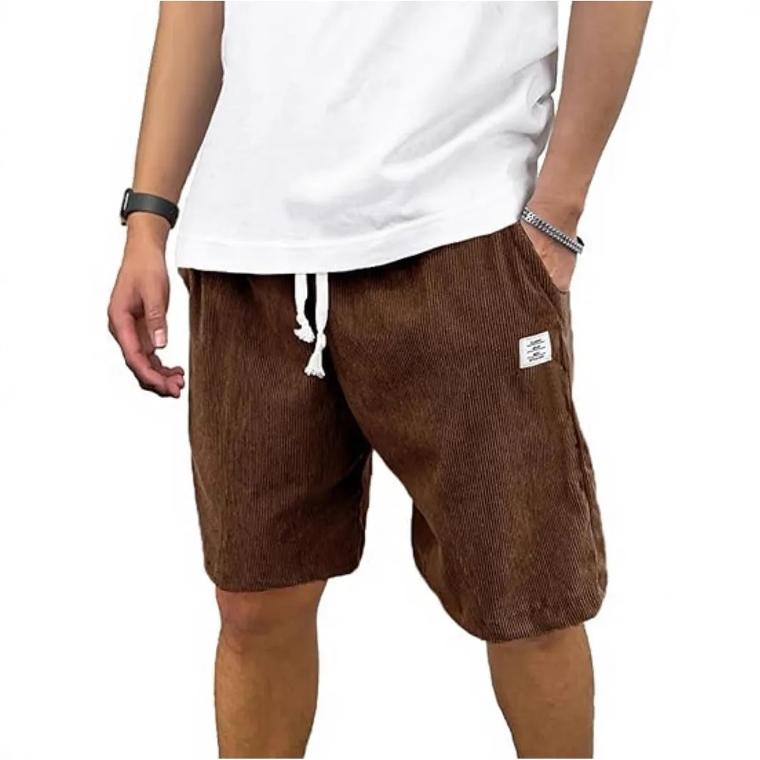 Men's straight-leg corduroy sports shorts in army green colour, showing texture and fit.