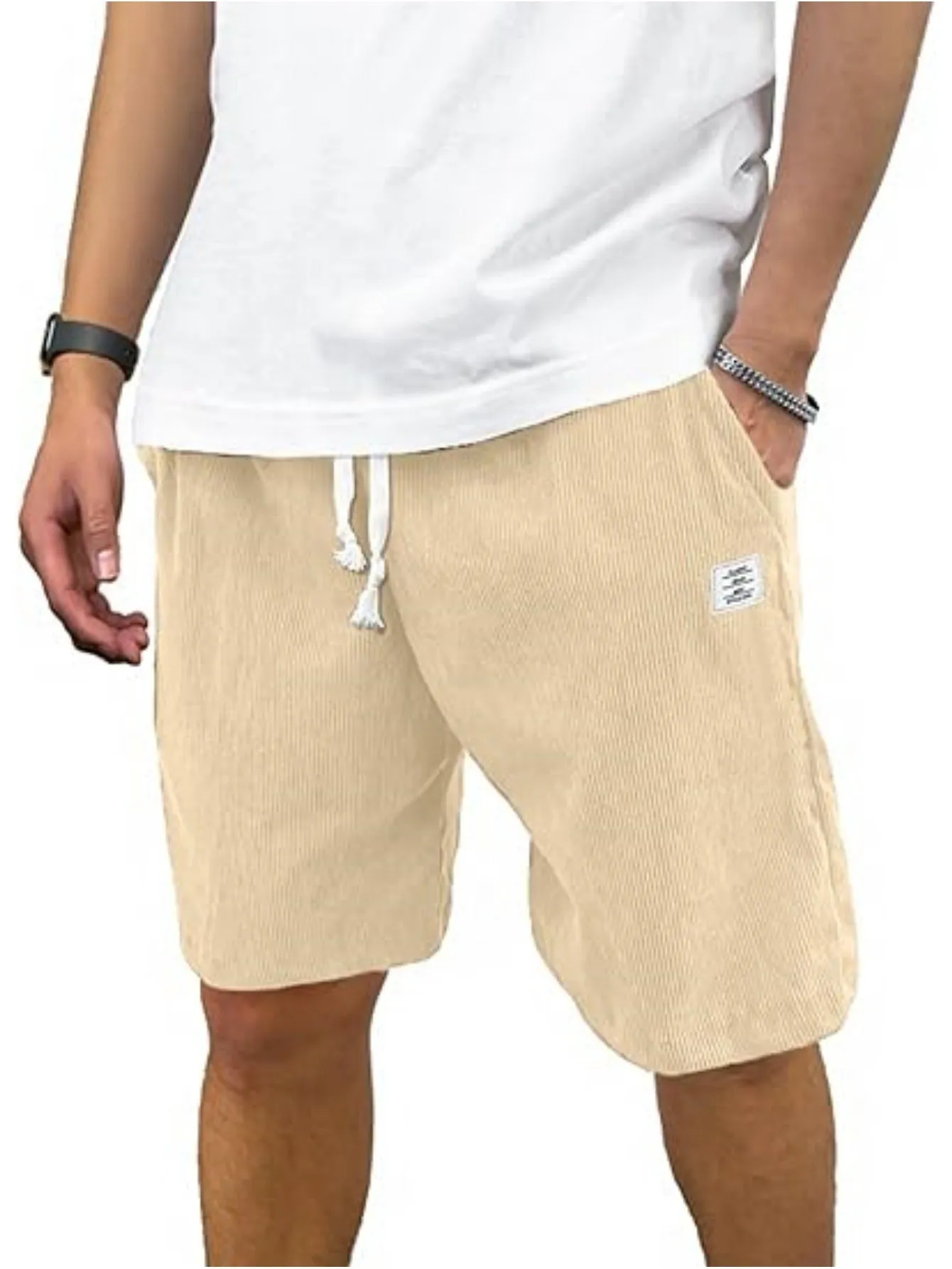 Men's straight-leg corduroy sports shorts in army green colour, showing texture and fit.
