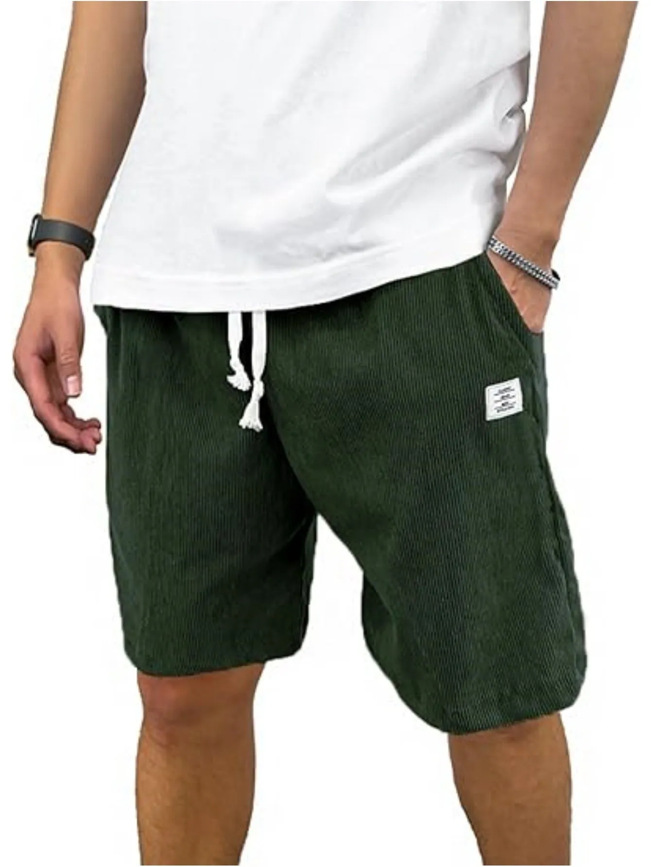 Men's straight-leg corduroy sports shorts in army green colour, showing texture and fit.