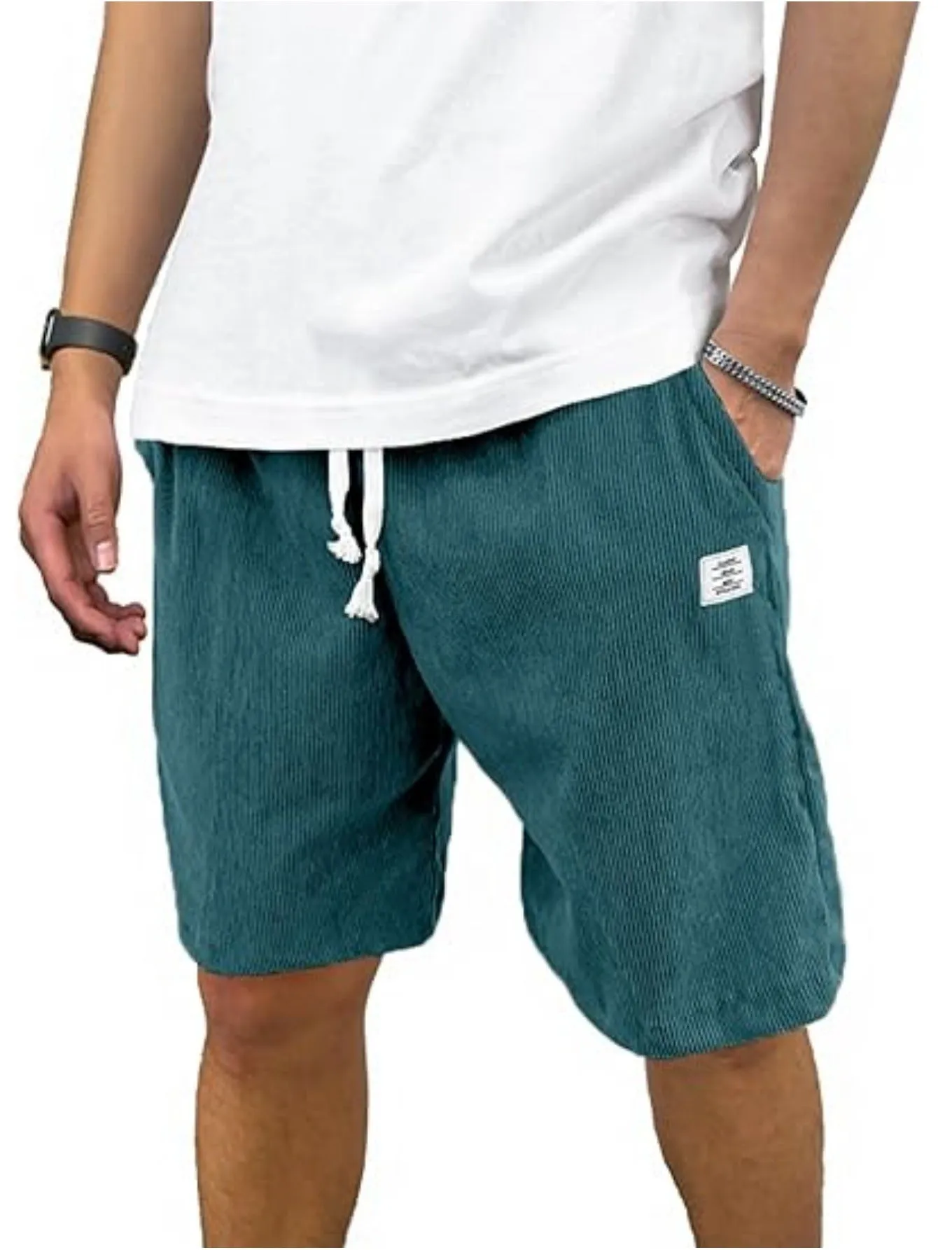 Men's straight-leg corduroy sports shorts in army green colour, showing texture and fit.