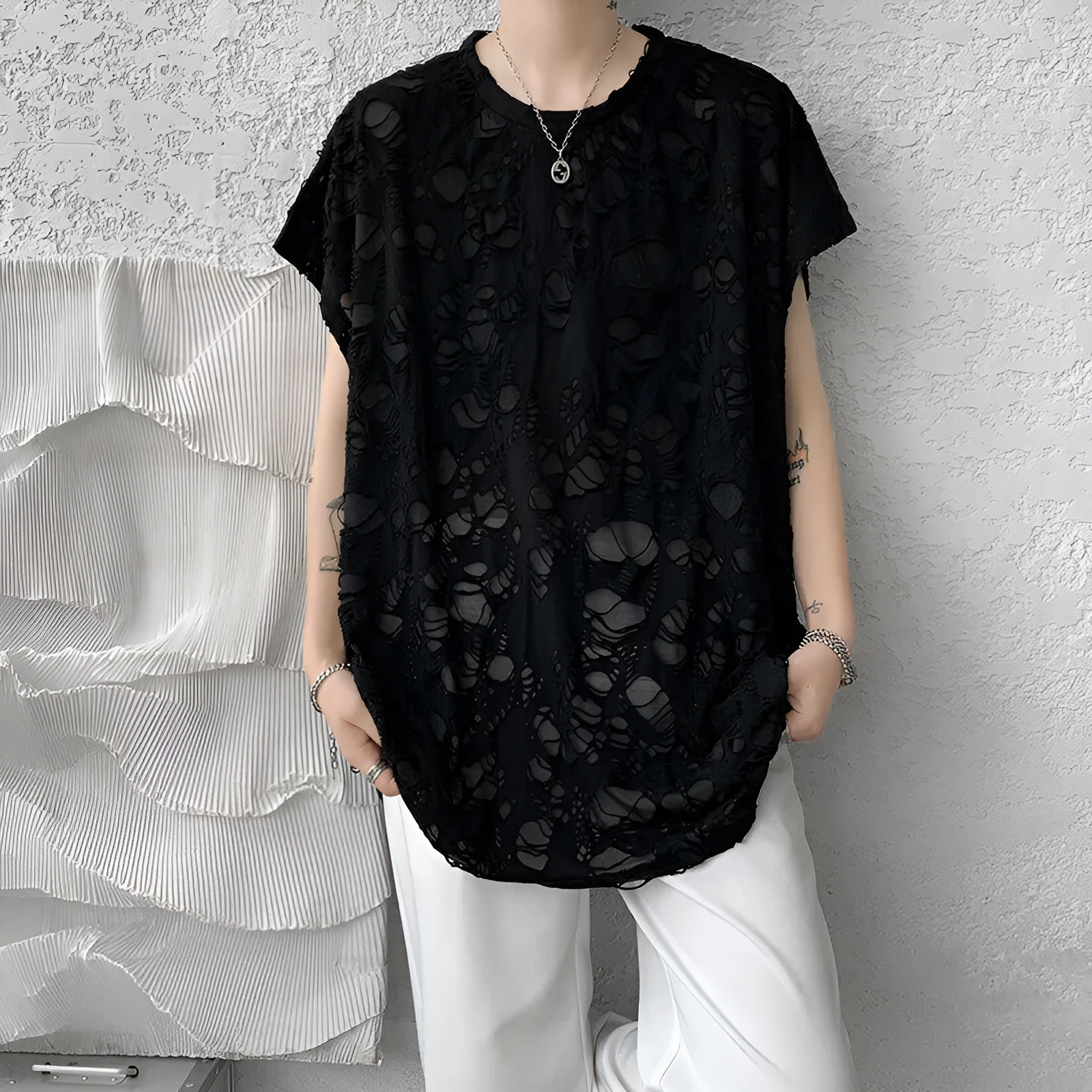 Black ripped beggar sleeveless wide shoulder vest for women, Japanese retro pullover style in polyester fibre, front view.