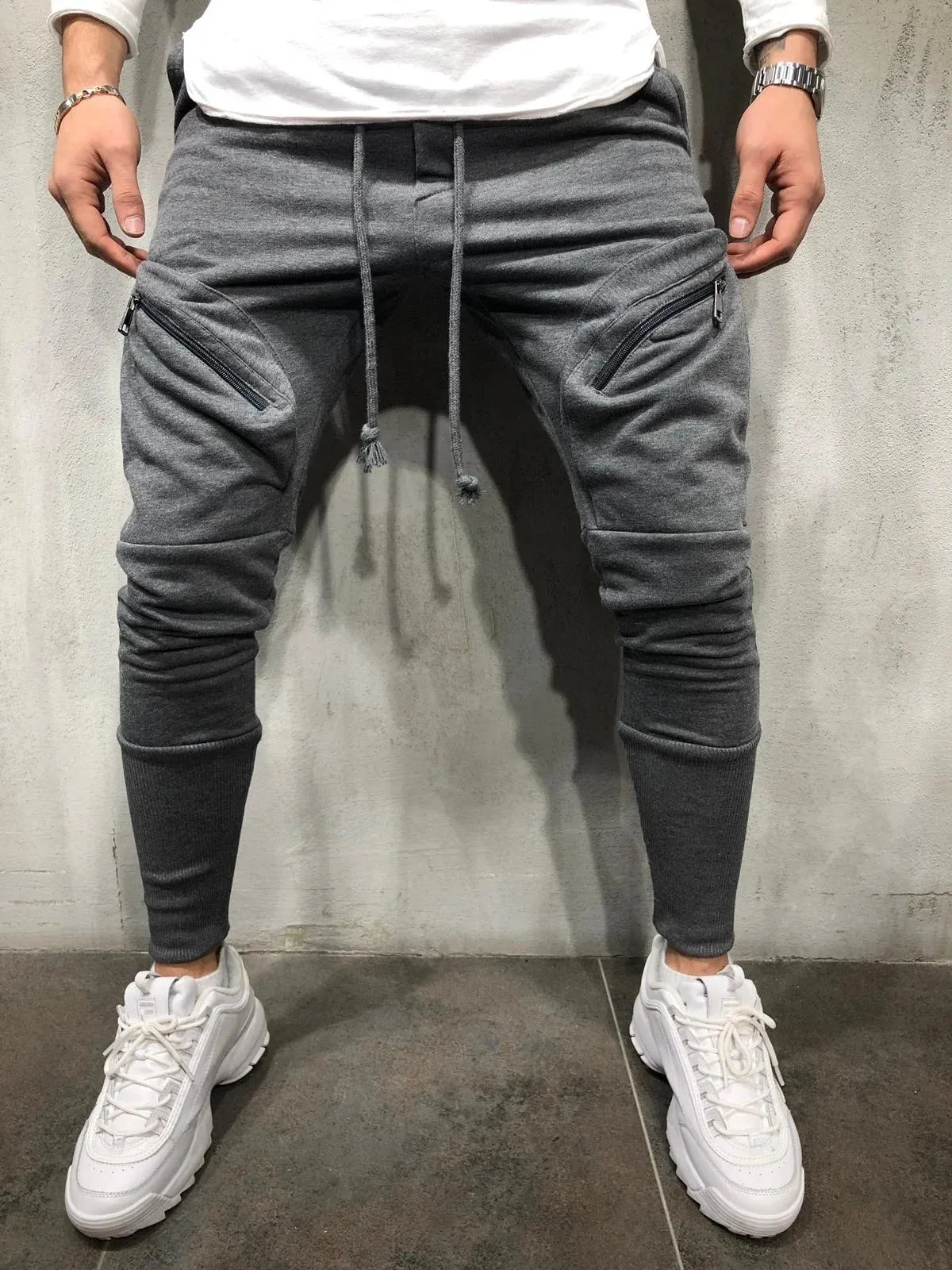 Men's cotton blended micro-elastic zipper casual trousers in black, tapered leg style