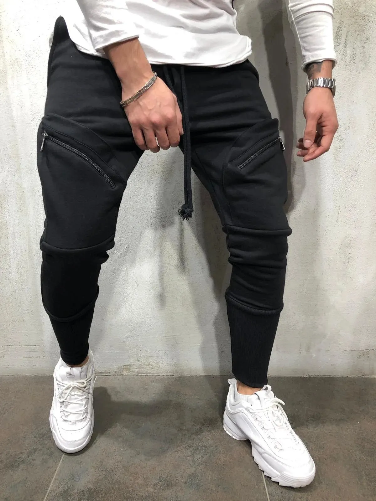 Men's cotton blended micro-elastic zipper casual trousers in black, tapered leg style