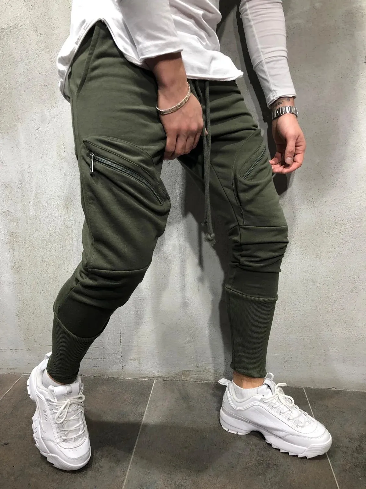 Men's cotton blended micro-elastic zipper casual trousers in black, tapered leg style