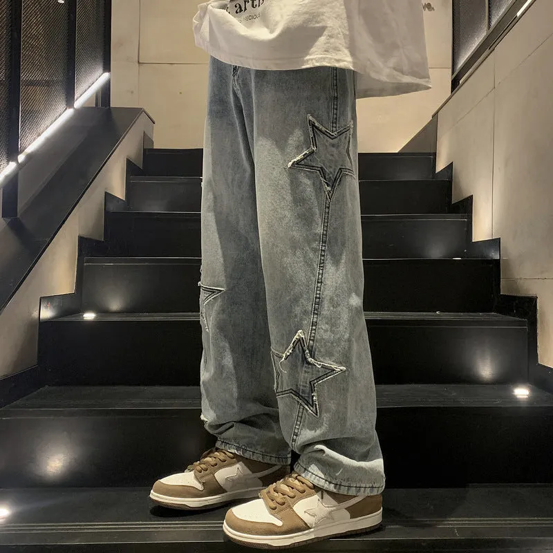 Loose fit cotton denim pants in stone washed light blue with straight leg, front view