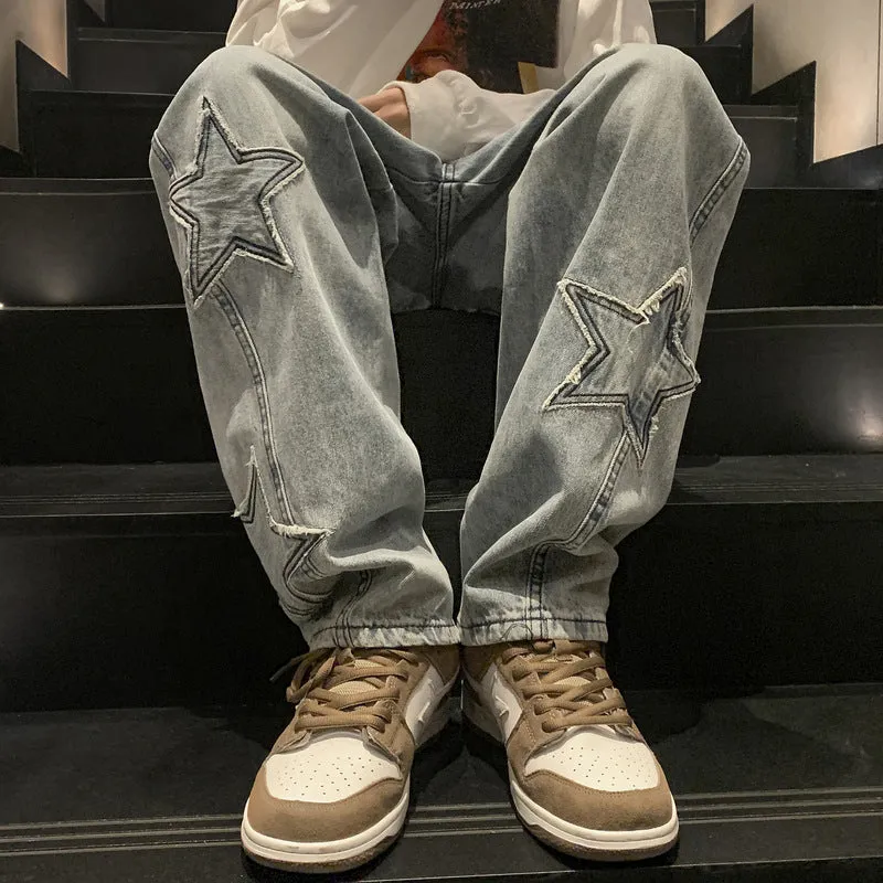 Loose fit cotton denim pants in stone washed light blue with straight leg, front view