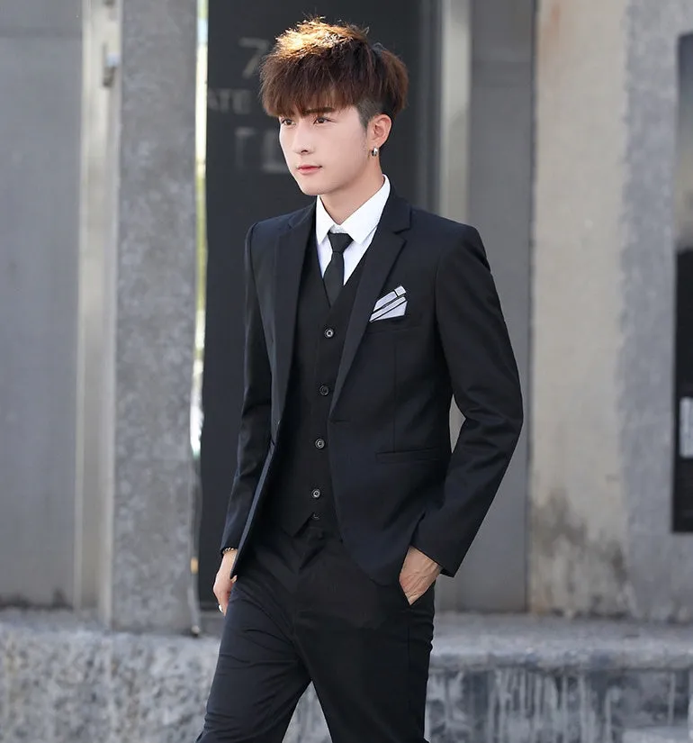 Men's three-piece Korean style slim fit suit in black with lapel collar and single button