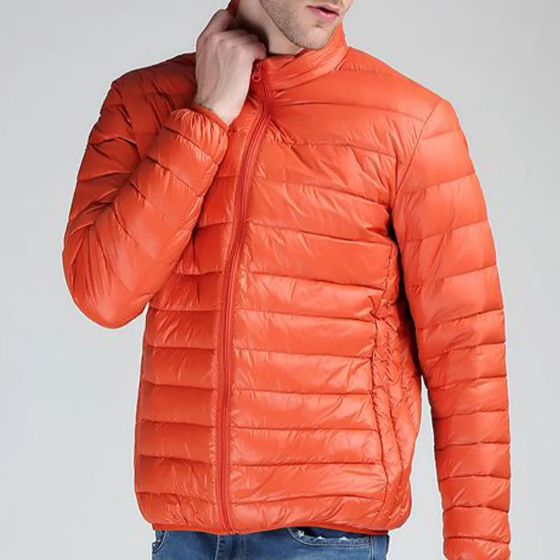 Men's stand collar winter coat in solid colour with zippered pockets, nylon fabric, 65cm length
