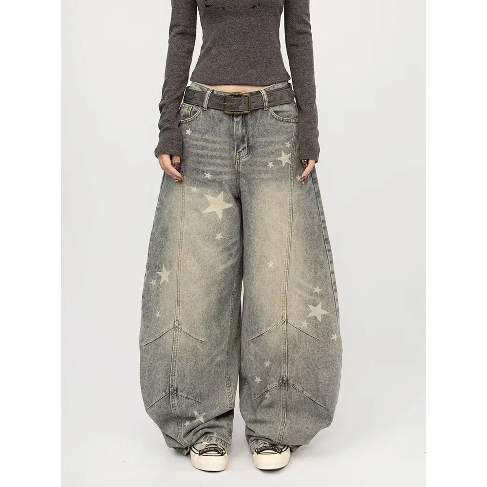 Men's blue loose fit vintage washed distressed gray splatter curved knife jeans on model