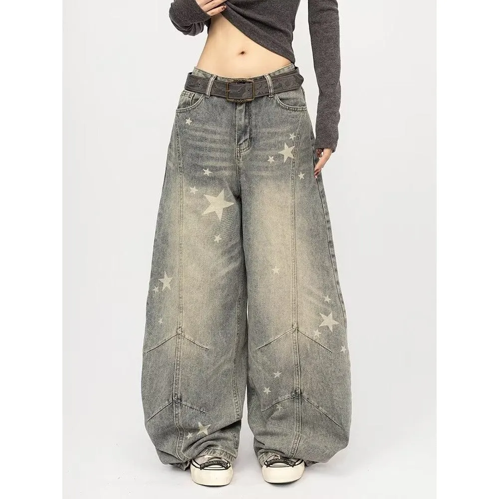 Men's blue loose fit vintage washed distressed gray splatter curved knife jeans on model