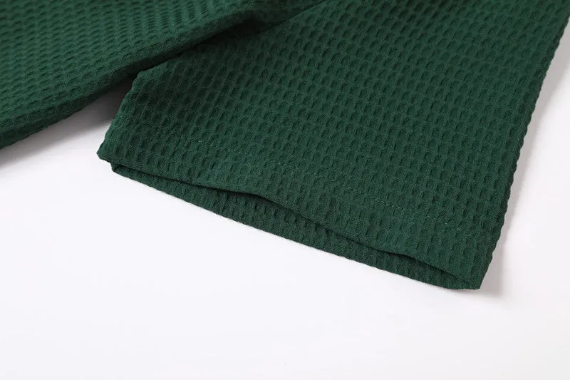 Retro waffle pattern dark green lapel Polo shirt with short sleeves and two metallic buttons