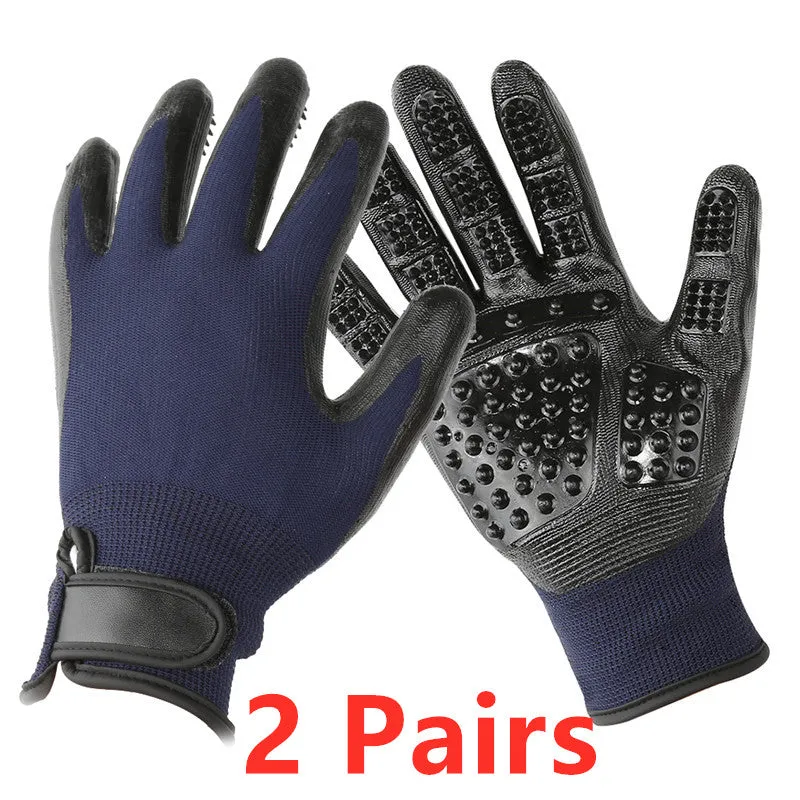 Pet hair grooming glove in black rubber with adjustable wrist strap on a light background