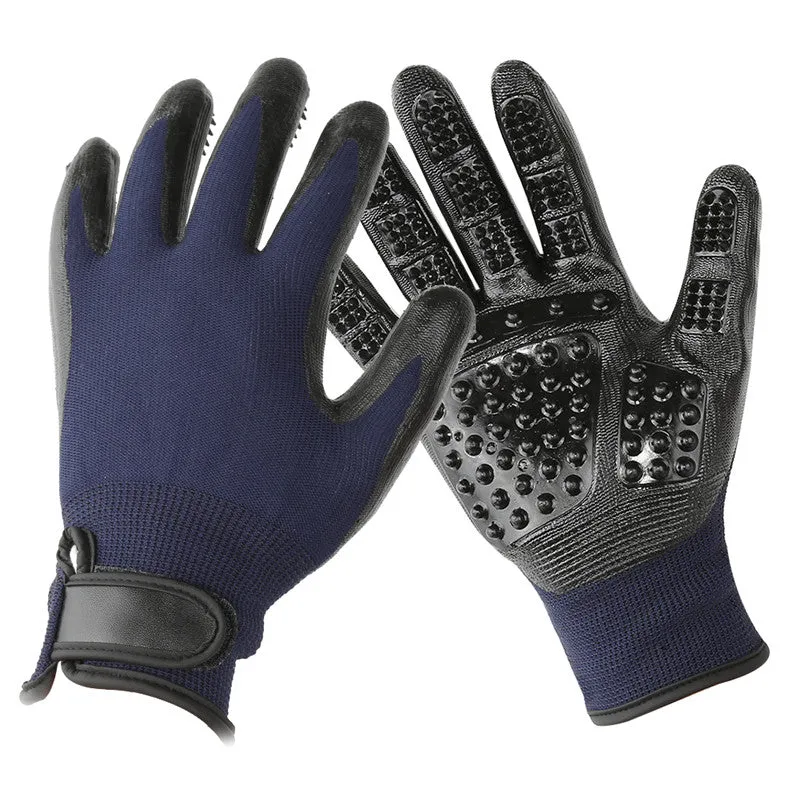 Pet hair grooming glove in black rubber with adjustable wrist strap on a light background