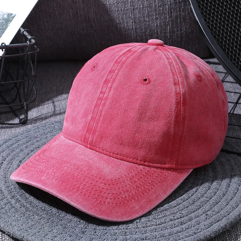 Washed cotton baseball cap in retro style with dome top and curved brim, adjustable 55-60cm