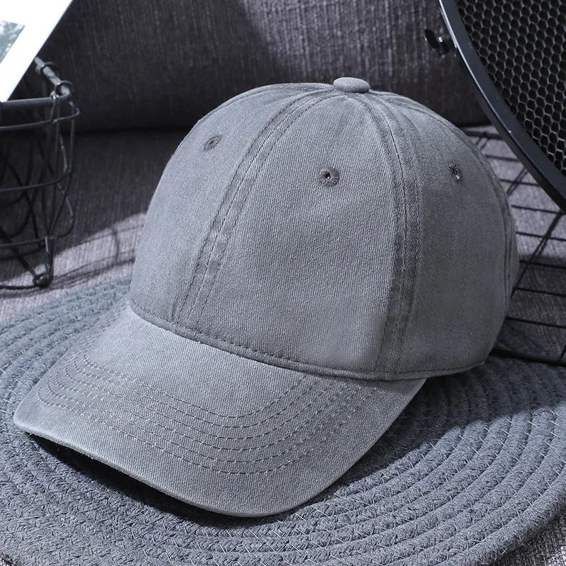 Washed cotton baseball cap in retro style with dome top and curved brim, adjustable 55-60cm