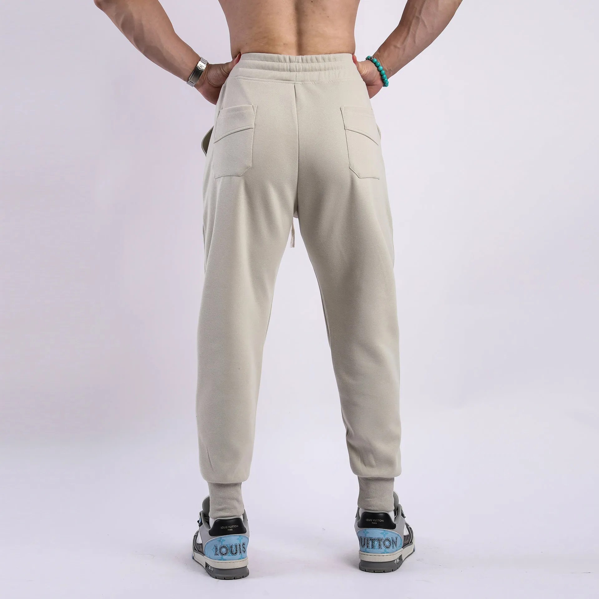 Men's casual trousers with ankle drawstring in polyester cotton fabric available in five colours