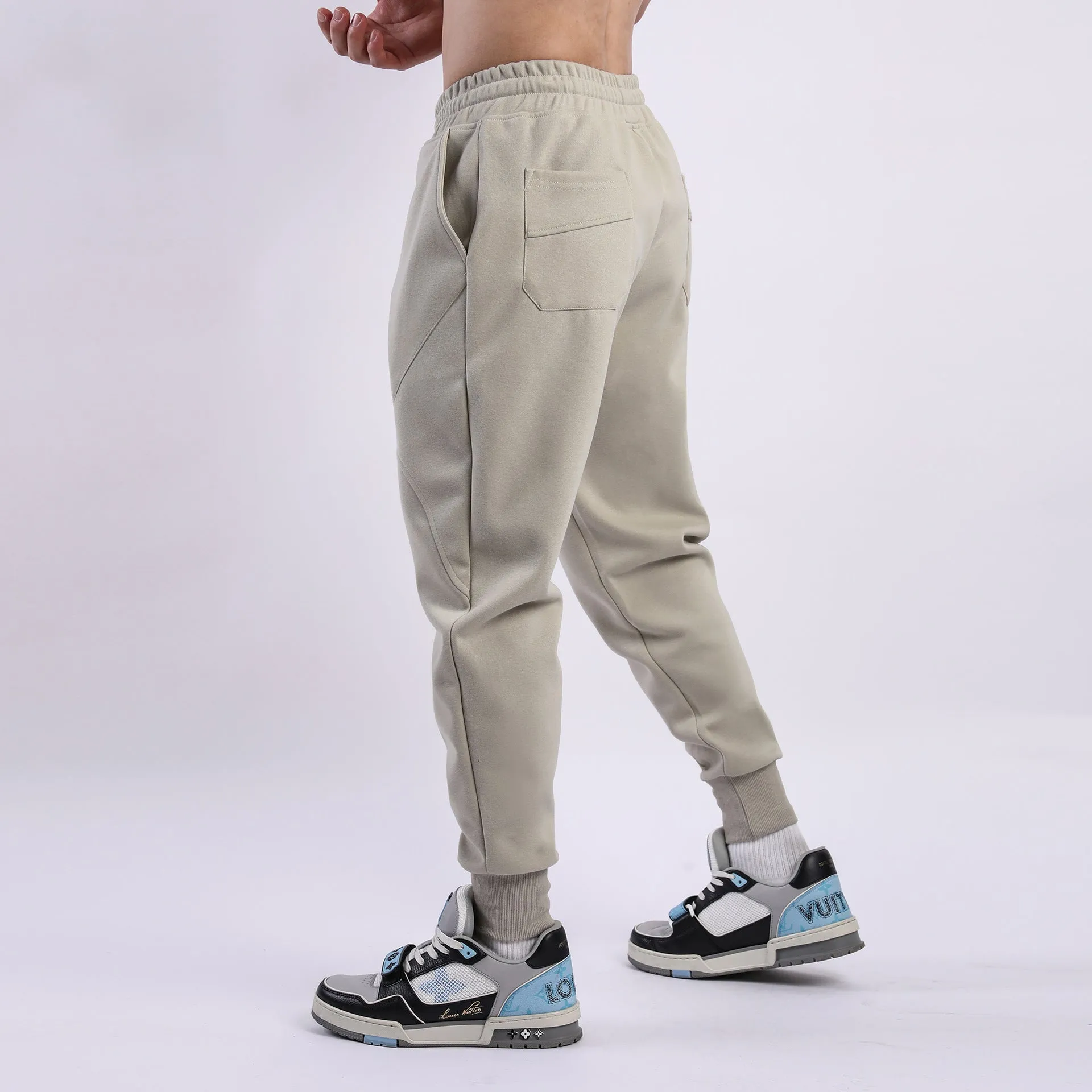 Men's casual trousers with ankle drawstring in polyester cotton fabric available in five colours
