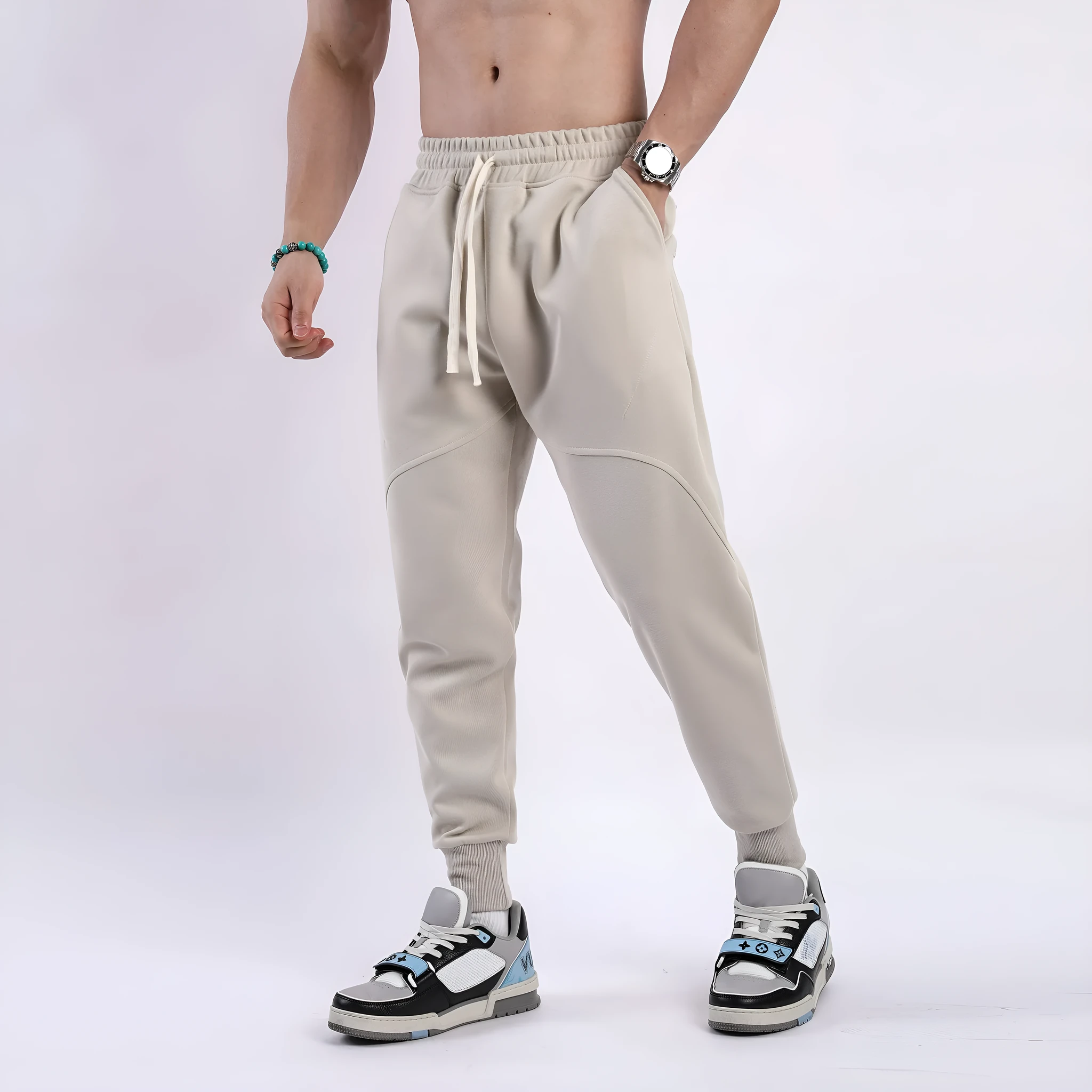 Men's casual trousers with ankle drawstring in polyester cotton fabric available in five colours