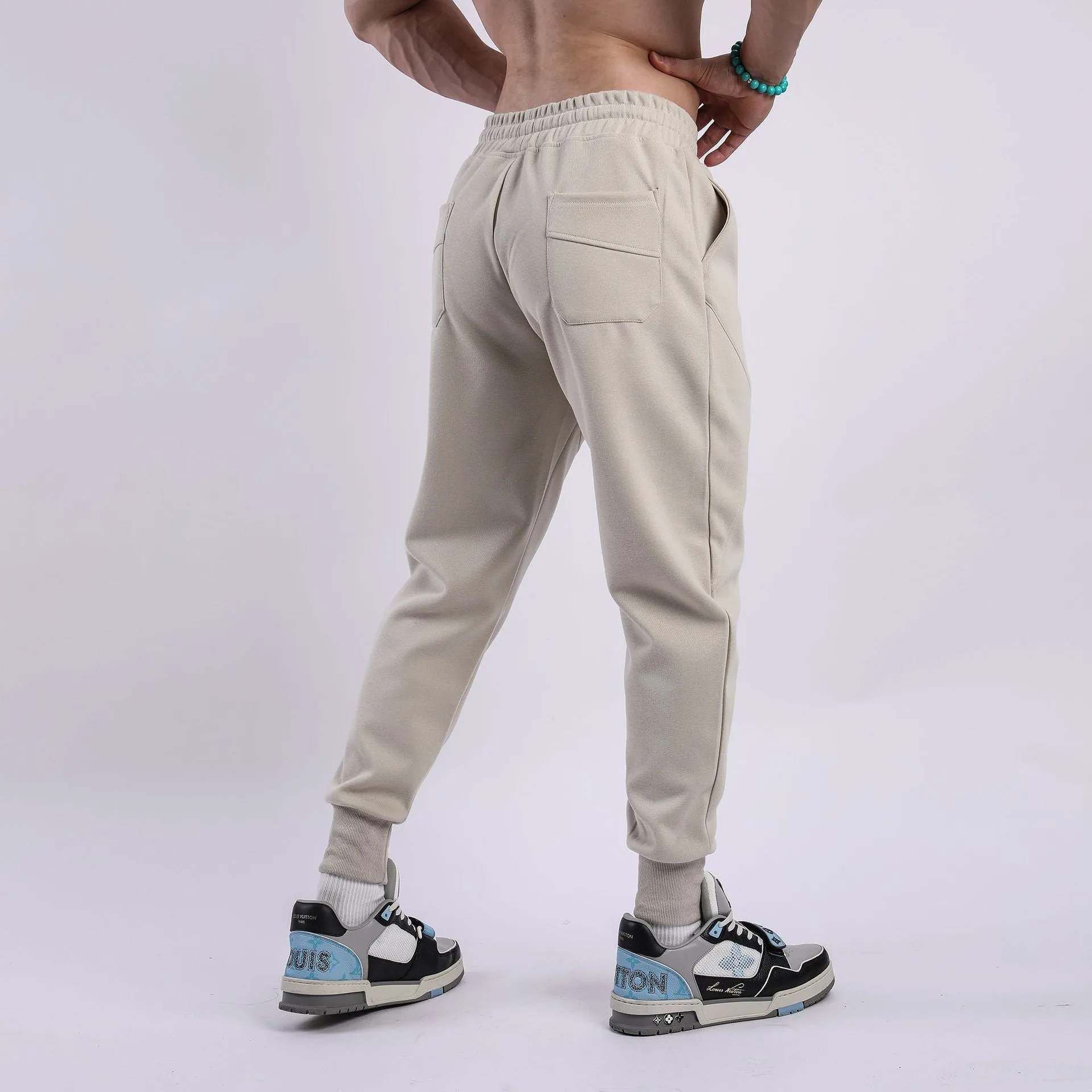 Men's casual trousers with ankle drawstring in polyester cotton fabric available in five colours