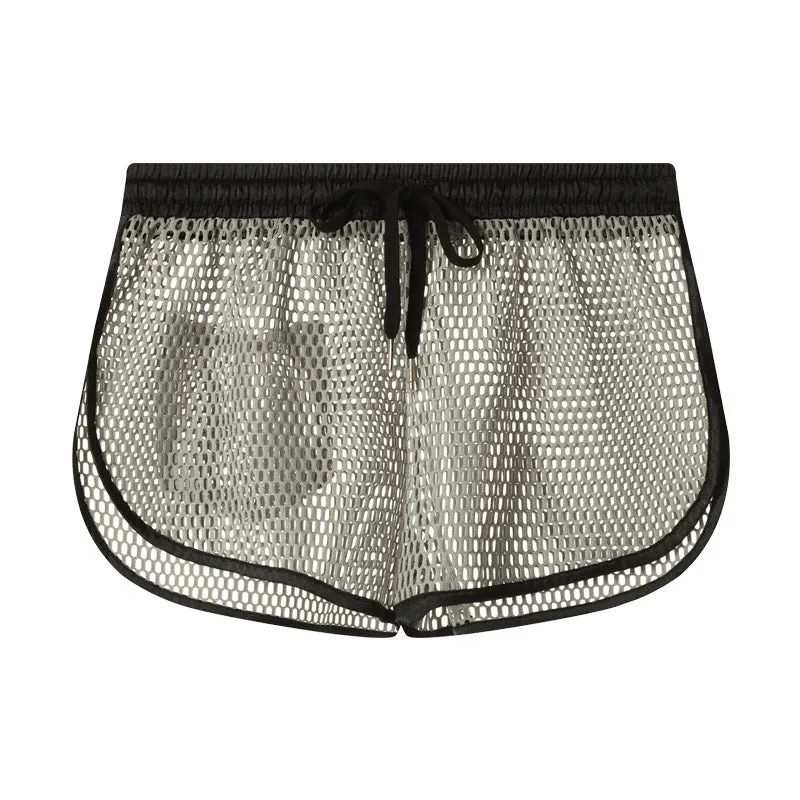 Men's solid colour loose boxer shorts in black, white, gray, or red on a size chart
