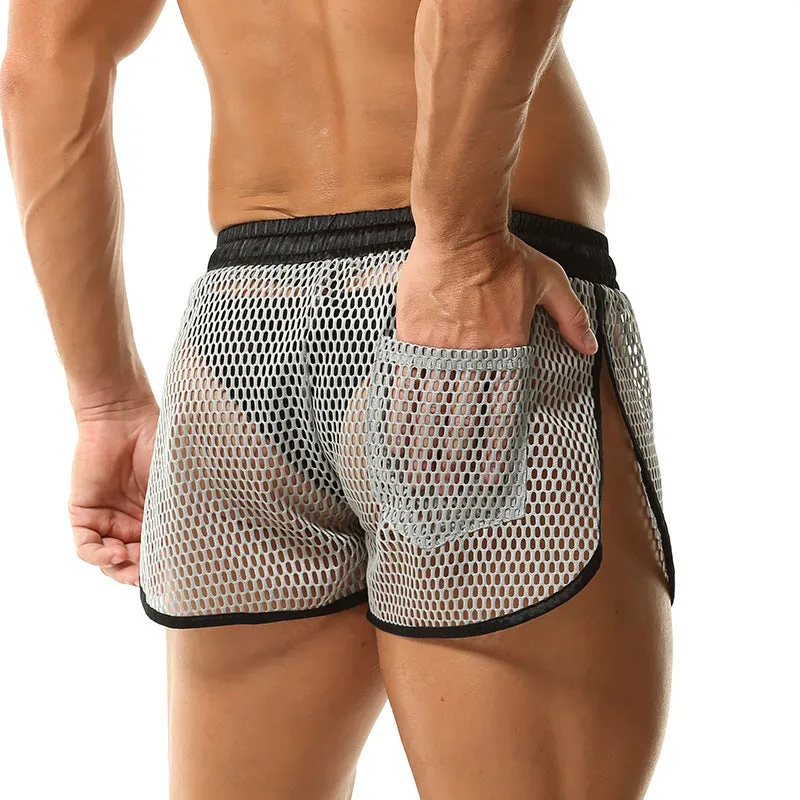 Men's solid colour loose boxer shorts in black, white, gray, or red on a size chart