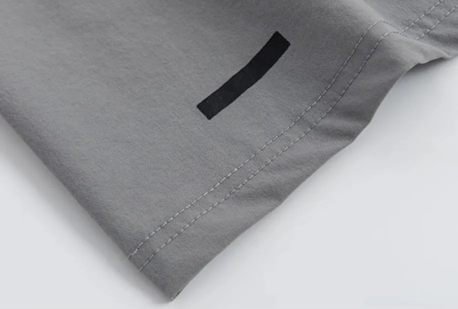 Loose cropped sports trousers in grey with printed waistband, moisture-wicking fabric for women