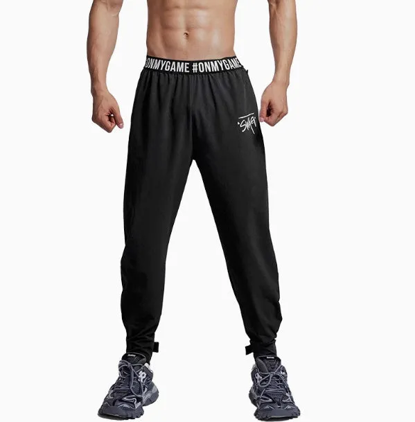 Loose cropped sports trousers in grey with printed waistband, moisture-wicking fabric for women
