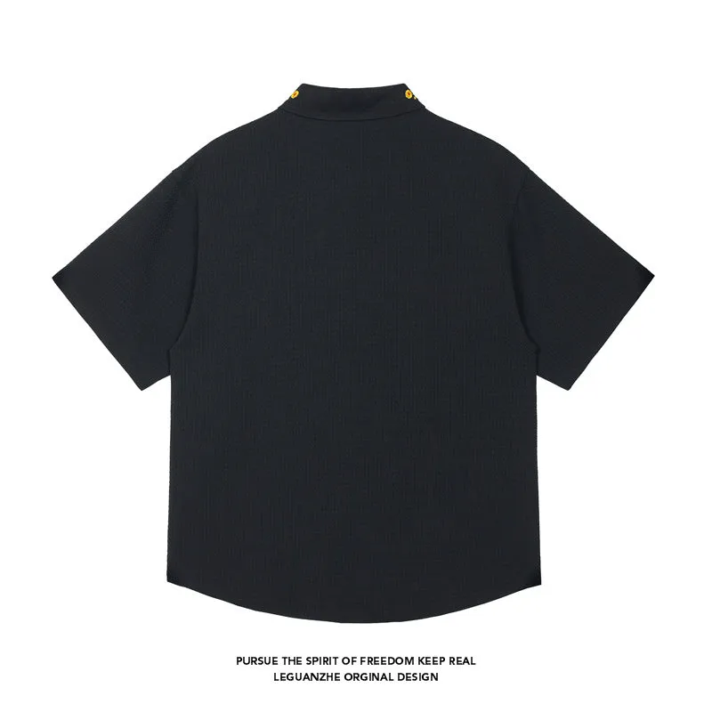 Embroidered short sleeve shirt in black with loose fit, polyester fabric, size M to 5XL