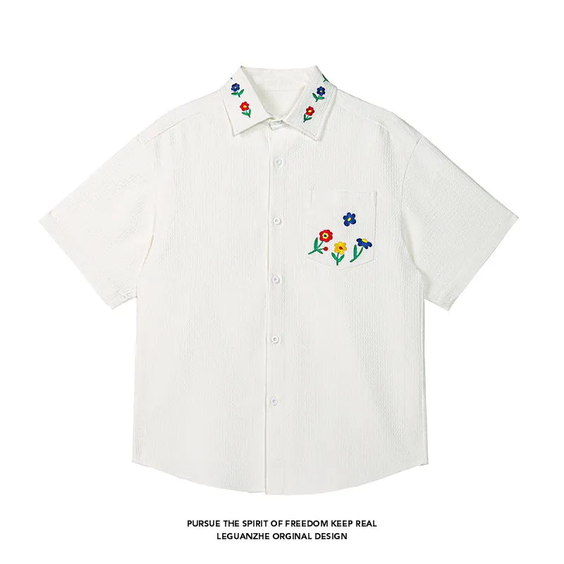 Embroidered short sleeve shirt in black with loose fit, polyester fabric, size M to 5XL