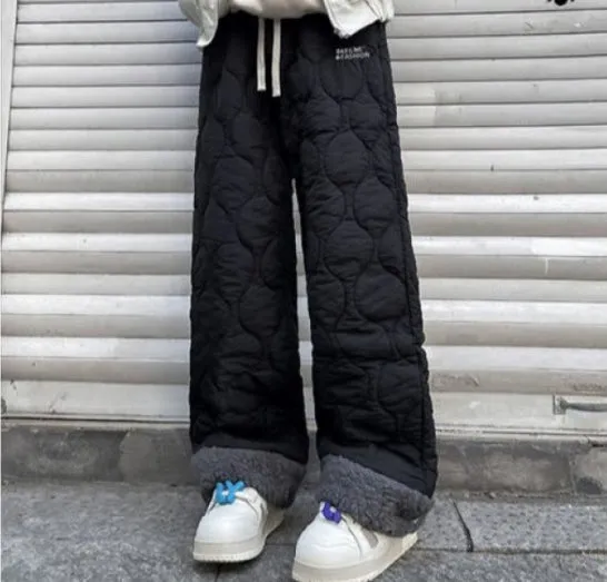 Winter cotton-padded waterproof patchwork lambskin cotton pants in black, side view