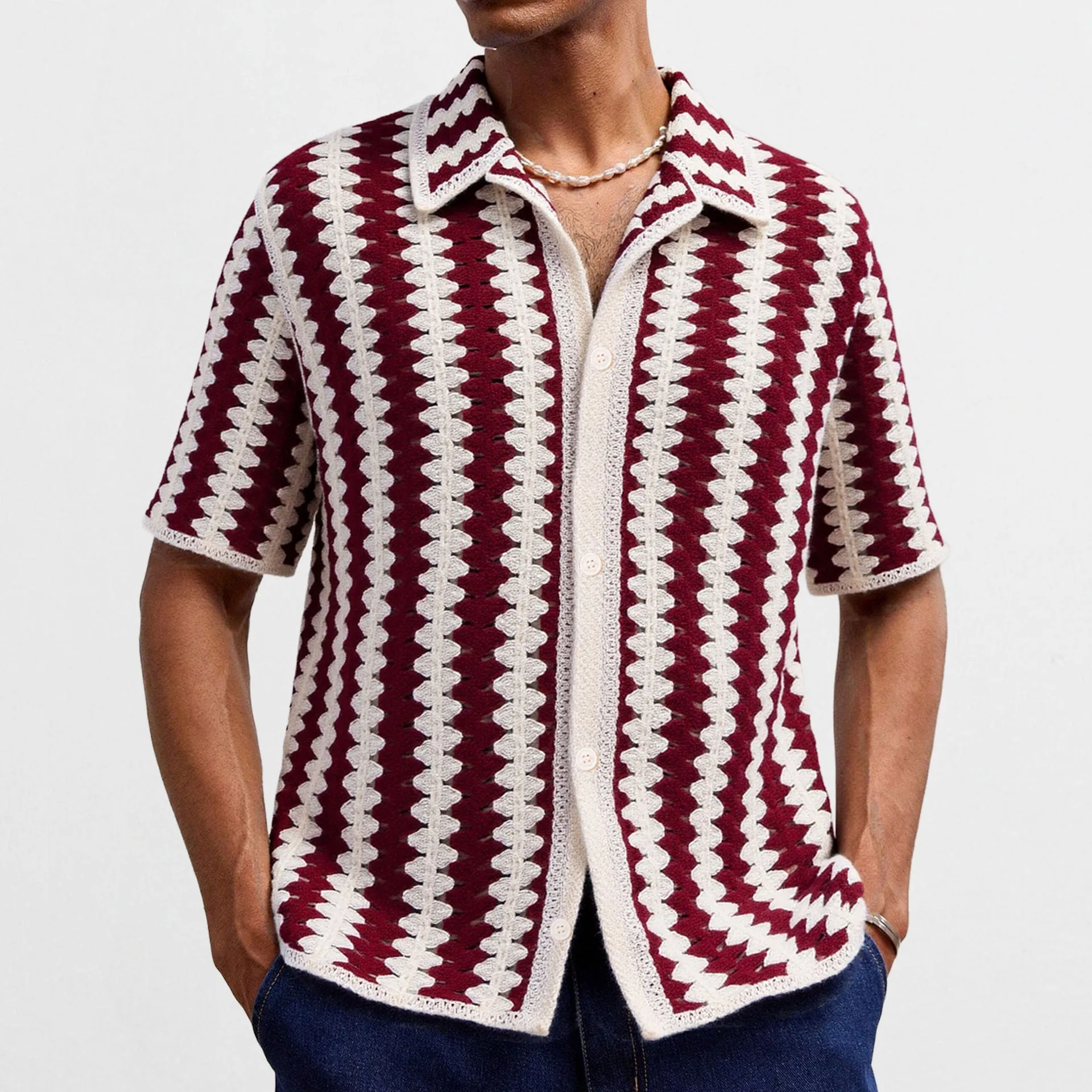 Red crocheted short-sleeved hollow shirt with vintage stripes and flocking detail on a woman