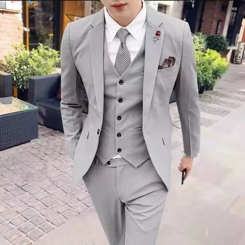 Men's three-piece business suit set in Korean slim fit style with trousers and matching tie