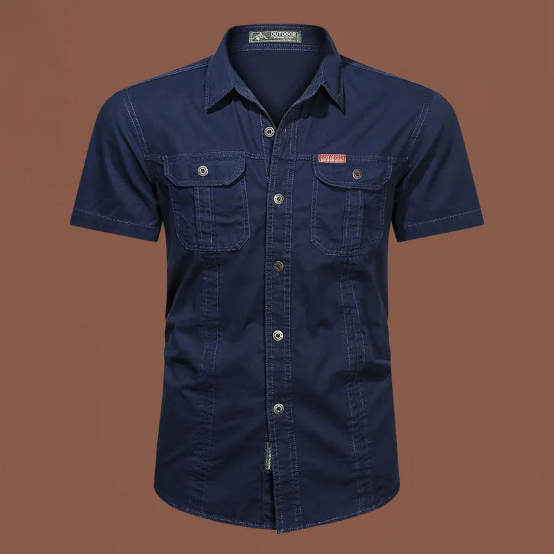 Men's army green cotton work shirt with short sleeves and a cardigan style, laid flat.