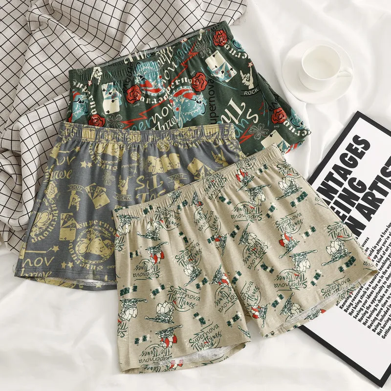 Men's grey printed cotton boxer shorts with a loose, casual fit and mid-waist design.