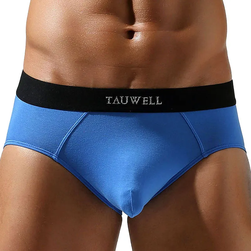 Men's solid colour low waist briefs in rayon fabric, available in multiple sizes