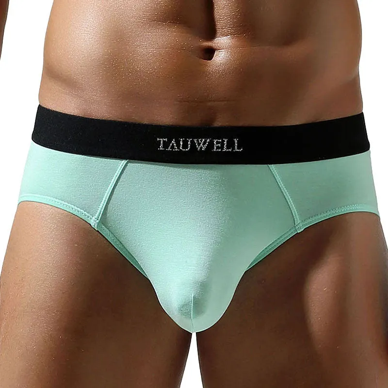 Men's solid colour low waist briefs in rayon fabric, available in multiple sizes
