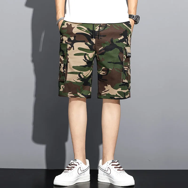 Men's camouflage 5-point workwear shorts in green, front view, with drawstring waist and mid-thigh length