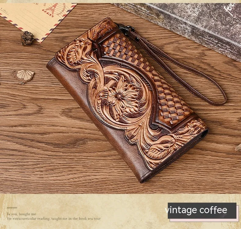 Women's brown tri-fold leather wallet with an embossed floral pattern, shown open to reveal compartments.